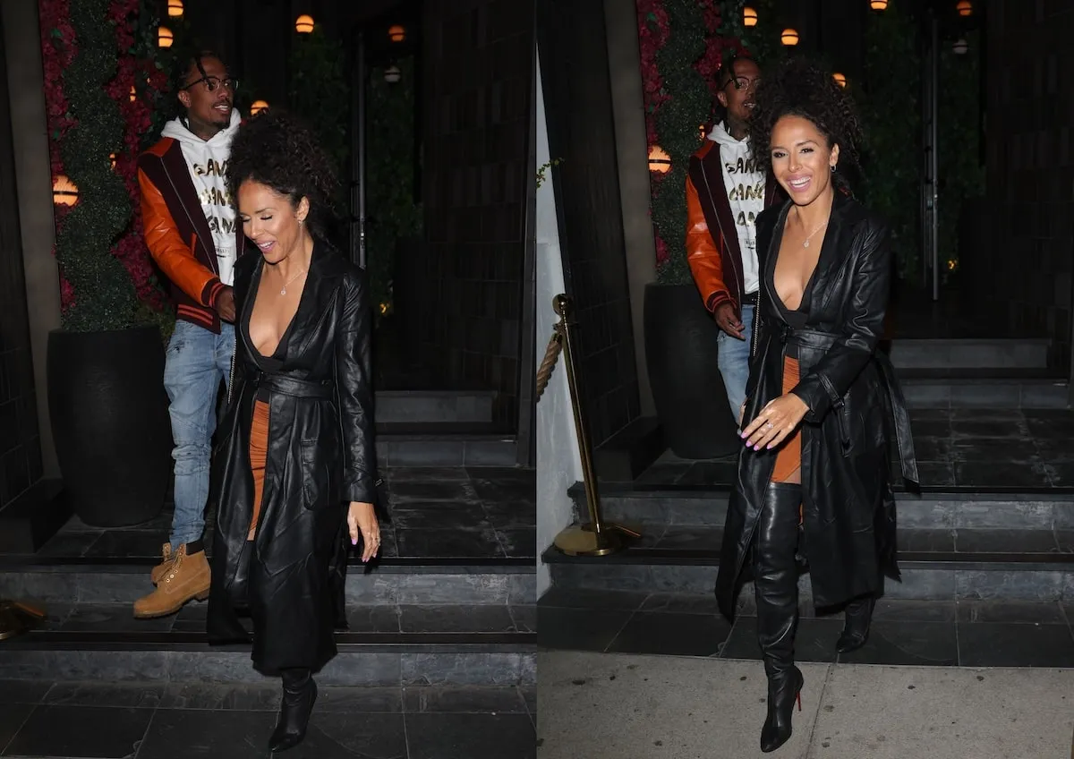 Walking down the steps of a restaurant, Nick Cannon and Brittany Bell laugh and hold hands