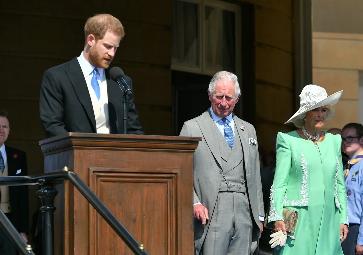 Prince Harry, King Charles, and Queen Camilla during The Prince of Wales' 70th Birthday Patronage Celebration at Buckingham Palace