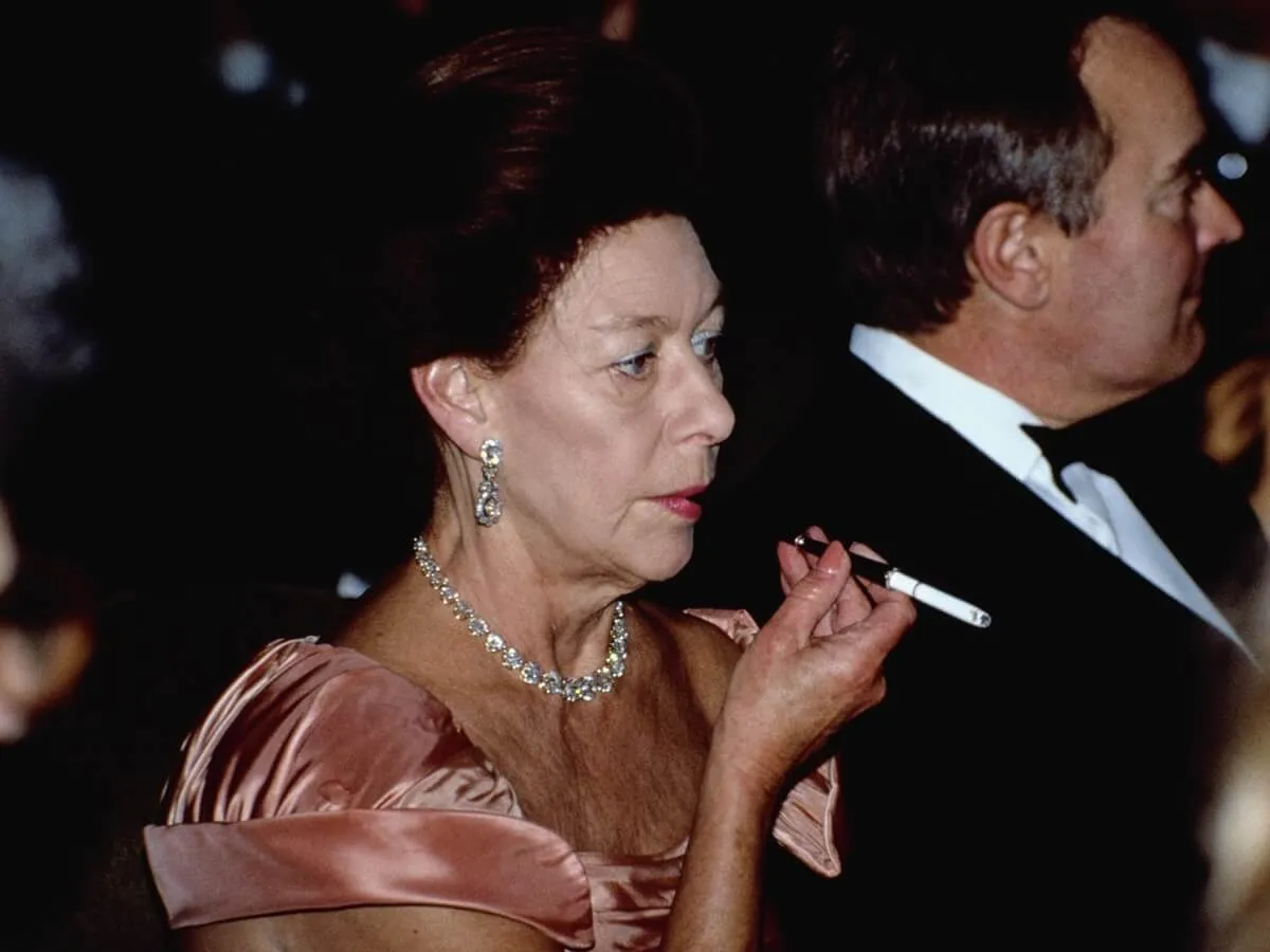 Princess Margaret holding a cigarette at a Gala dinner for the AIDS Crisis Trust in London