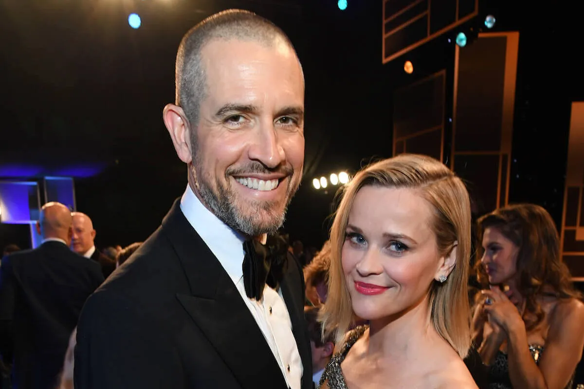 Reese Witherspoon stands next to her ex-husband, Jim Toth