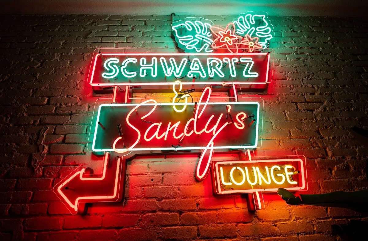 Neon sign advertising Schwartz & Sandy's