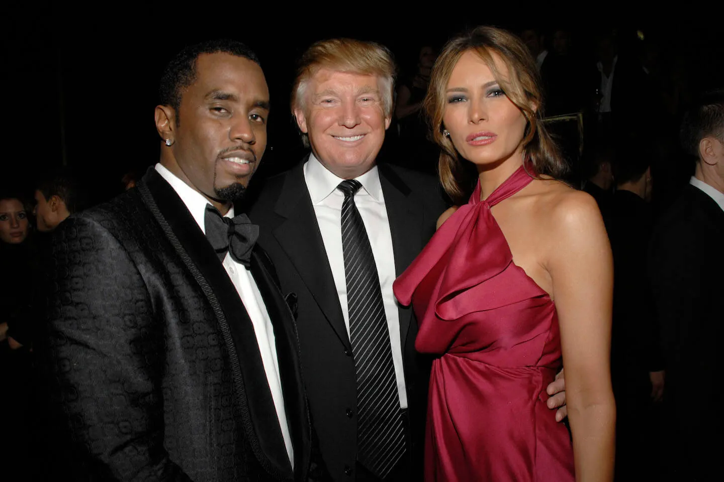 Sean 'Diddy' Combs, Donald Trump, and Melania Trump posing together in 2008