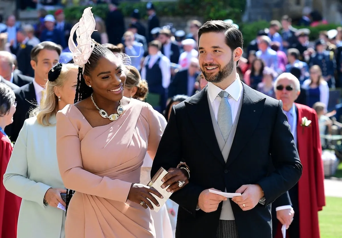 Wearing a pink gown, Serena Williams arrives with her husband Alexis Ohanian for Prince Harry and Meghan Markle's wedding