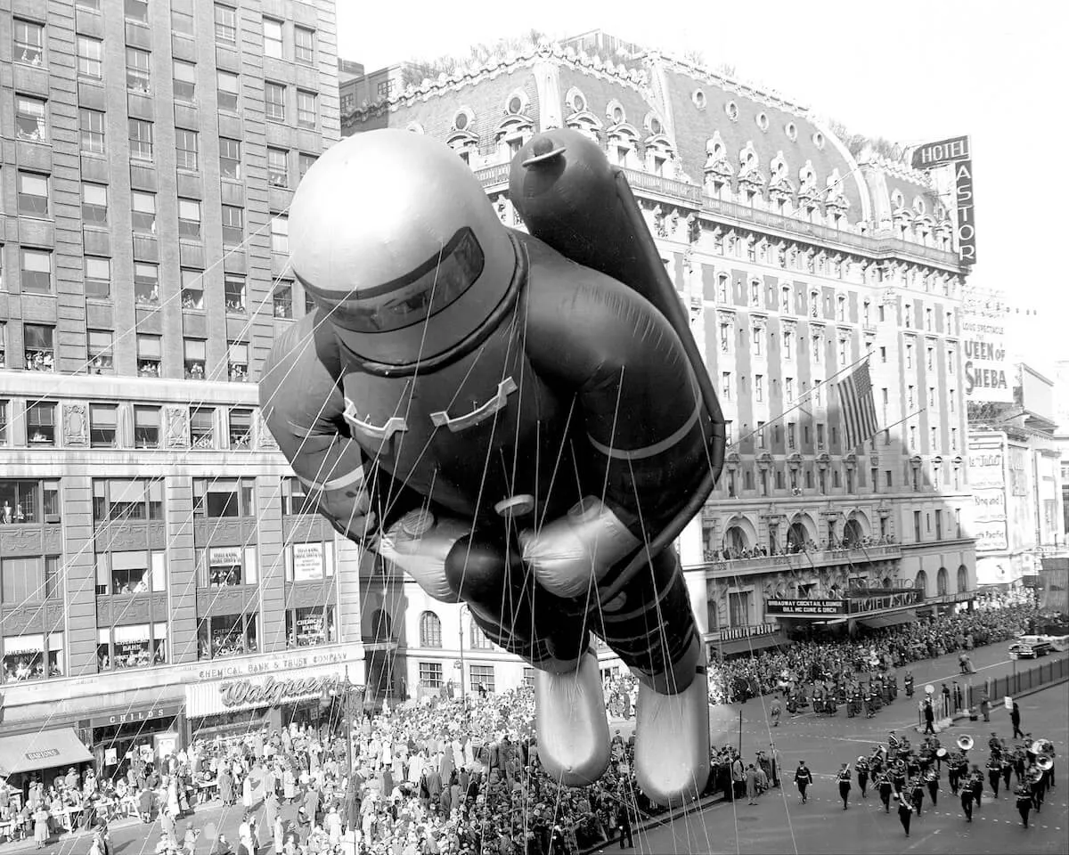 Black and white photo of a spaceman balloon in the 1953 Macy's parade