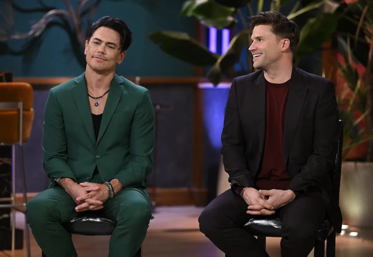 Tom Sandoval and Tom Schwartz of 'Vanderpump Rules' sitting on a couch