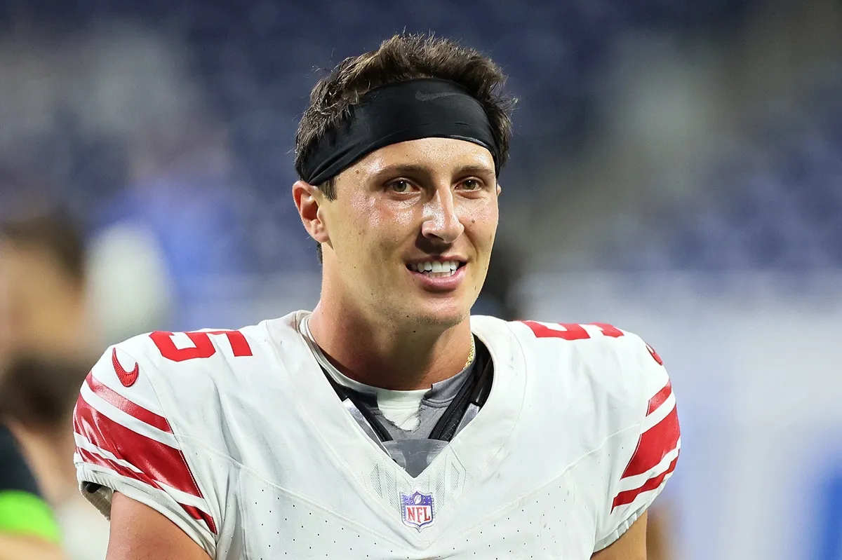 Quarterback Tommy DeVito (5) of the New York Giants walks off the field at the conclusion of an NFL preseason football game opener against the New York Giants in Detroit, Michigan USA, on Friday, August 11, 2023