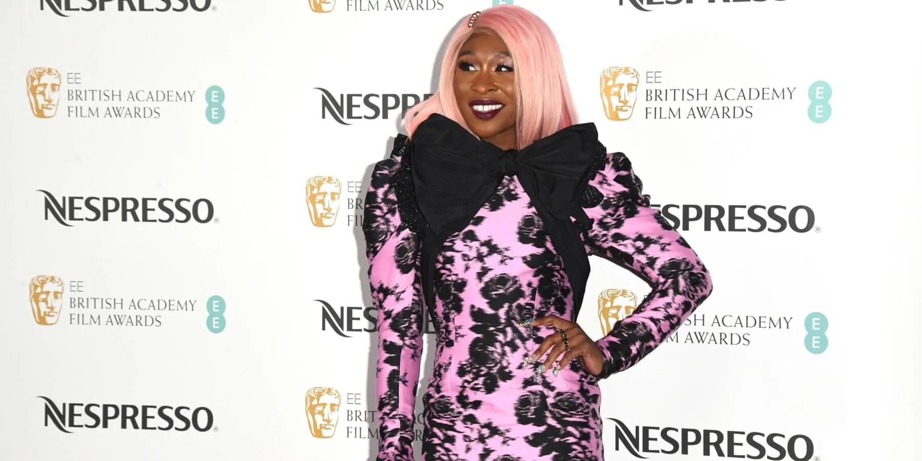 Cynthia Erivo sports a pink shoulder-length wig at a at Kensington Palace on February 9, 2019.