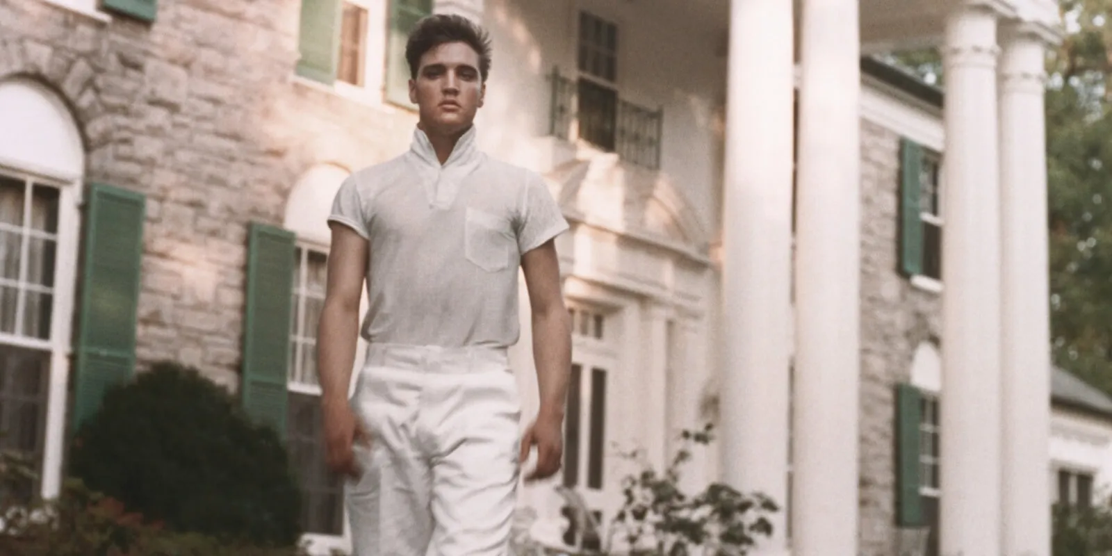 Elvis Presley posed for a photograph on the grounds of his Graceland home.