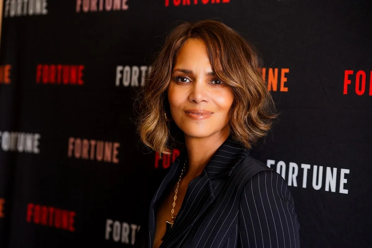 Halle Berry posing in a black out fit at the Fortune's Most Powerful Women Summit 2024.