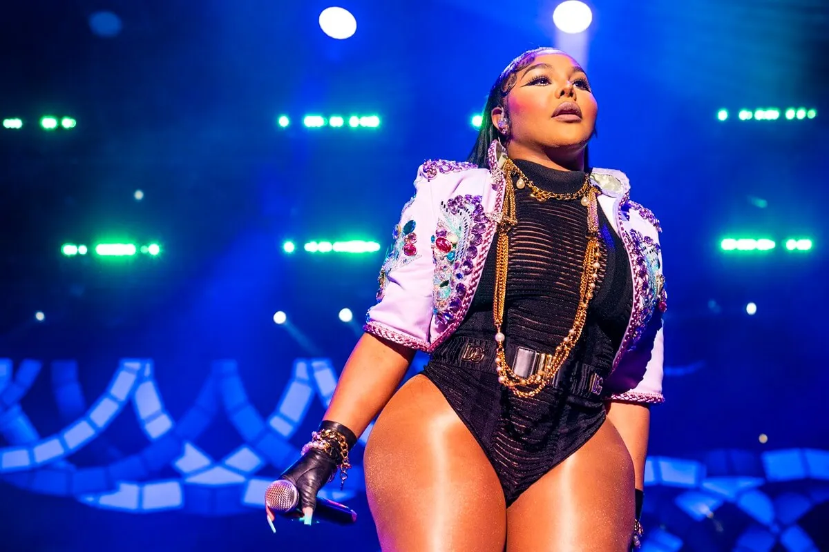 Lil' Kim posing on stage at the 2022 Essence Festival of Culture.