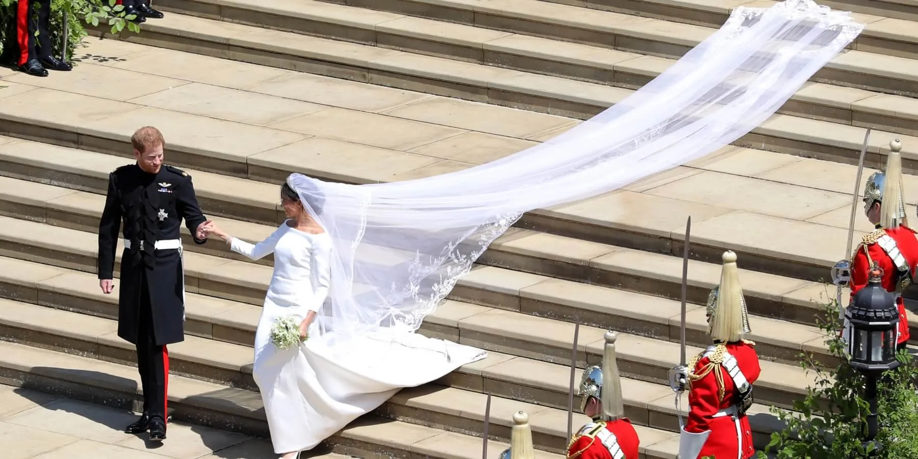 Prince Harry and Meghan Markle exit church on their wedding day.