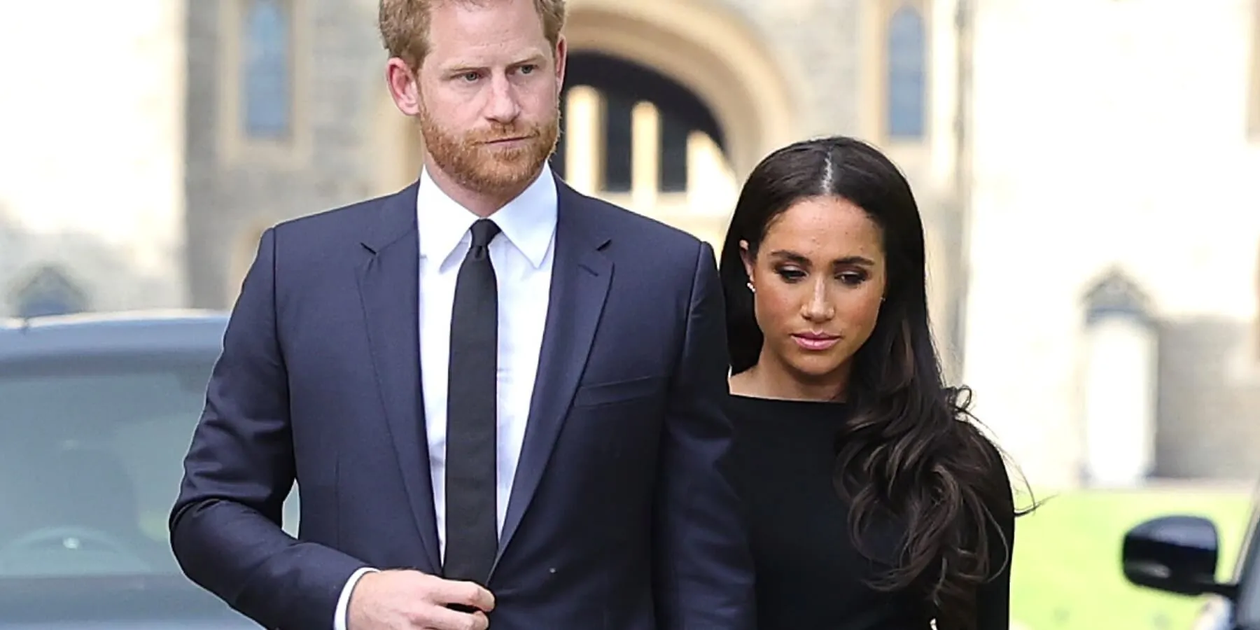 Prince Harry and Meghan Markle not smiling