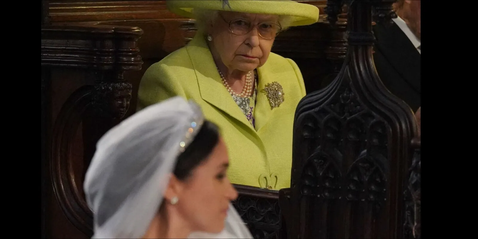 Queen Elizabeth looks at Meghan Markle on her wedding day to Prince Harry