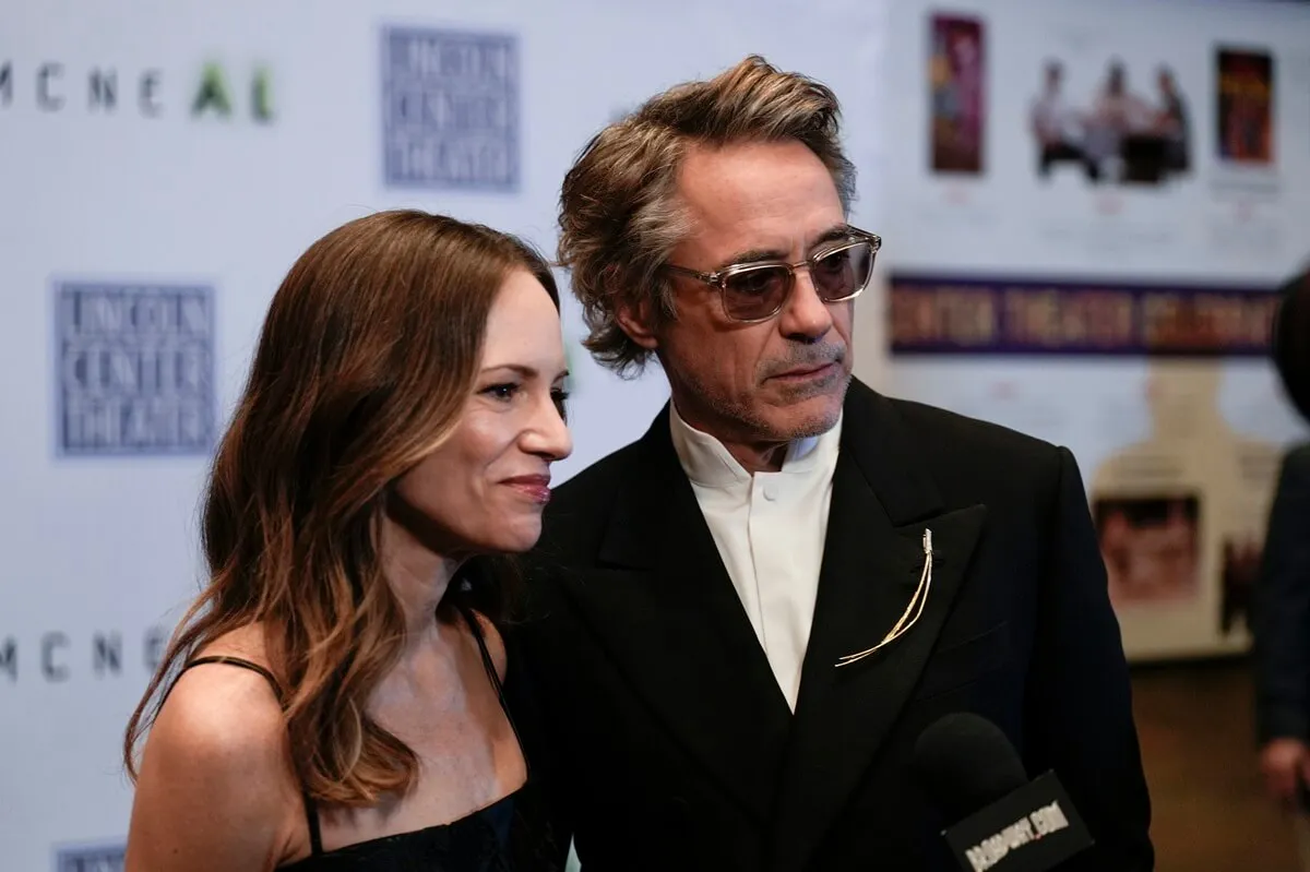 Robert Downey Jr. posing alongside Susan Levin at the premiere of the movie 'Mcneal'.