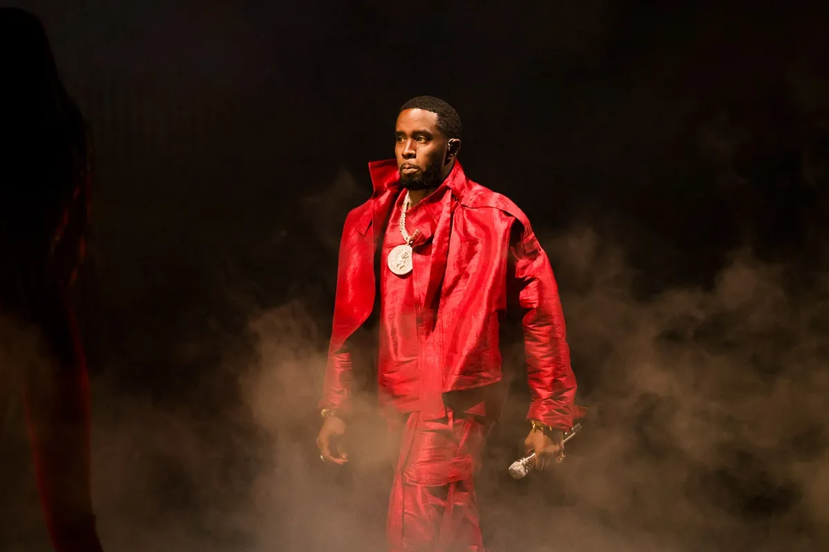 Sean 'Diddy' Combs performing at the MTV Video Music Awards in a red outfit.