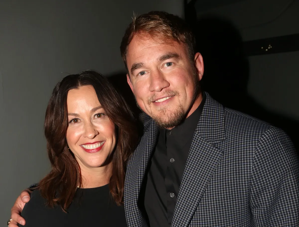 Alanis Morissette and husband, Mario “Souleye” Treadway, pose at the opening night of the musical 'Jagged Little Pill' on Broadway