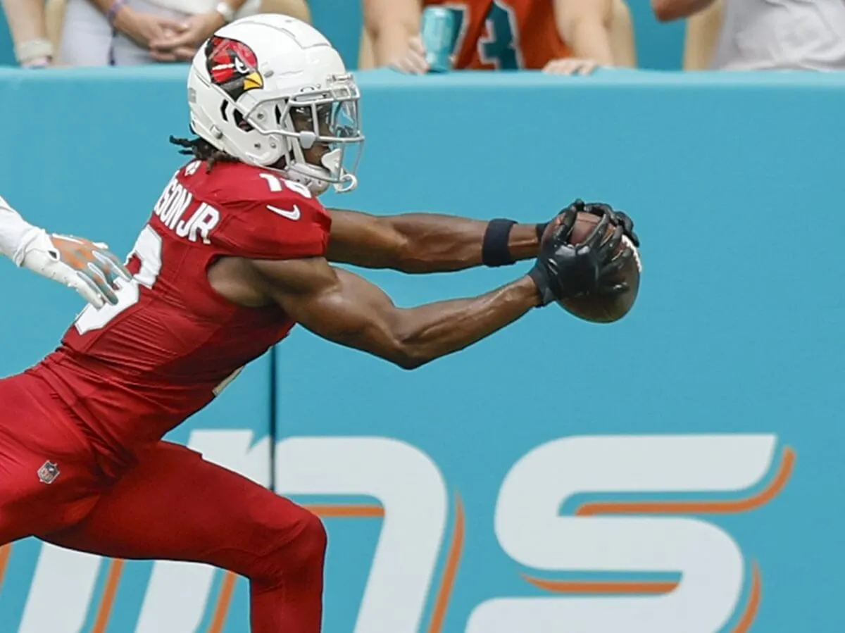 Arizona Cardinals wide receiver Marvin Harrison Jr. catches a touchdown pass as Miami Dolphins