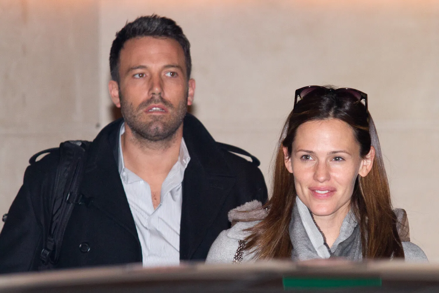 Ben Affleck and Jennifer Garner standing side by side after leaving a hotel in Paris in 2012