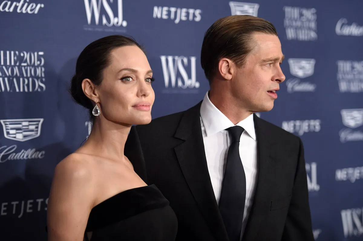 Brad Pitt and Angelina Jolie in matching-colored outfits attend the WSJ. Magazine 2015 Innovator Awards.