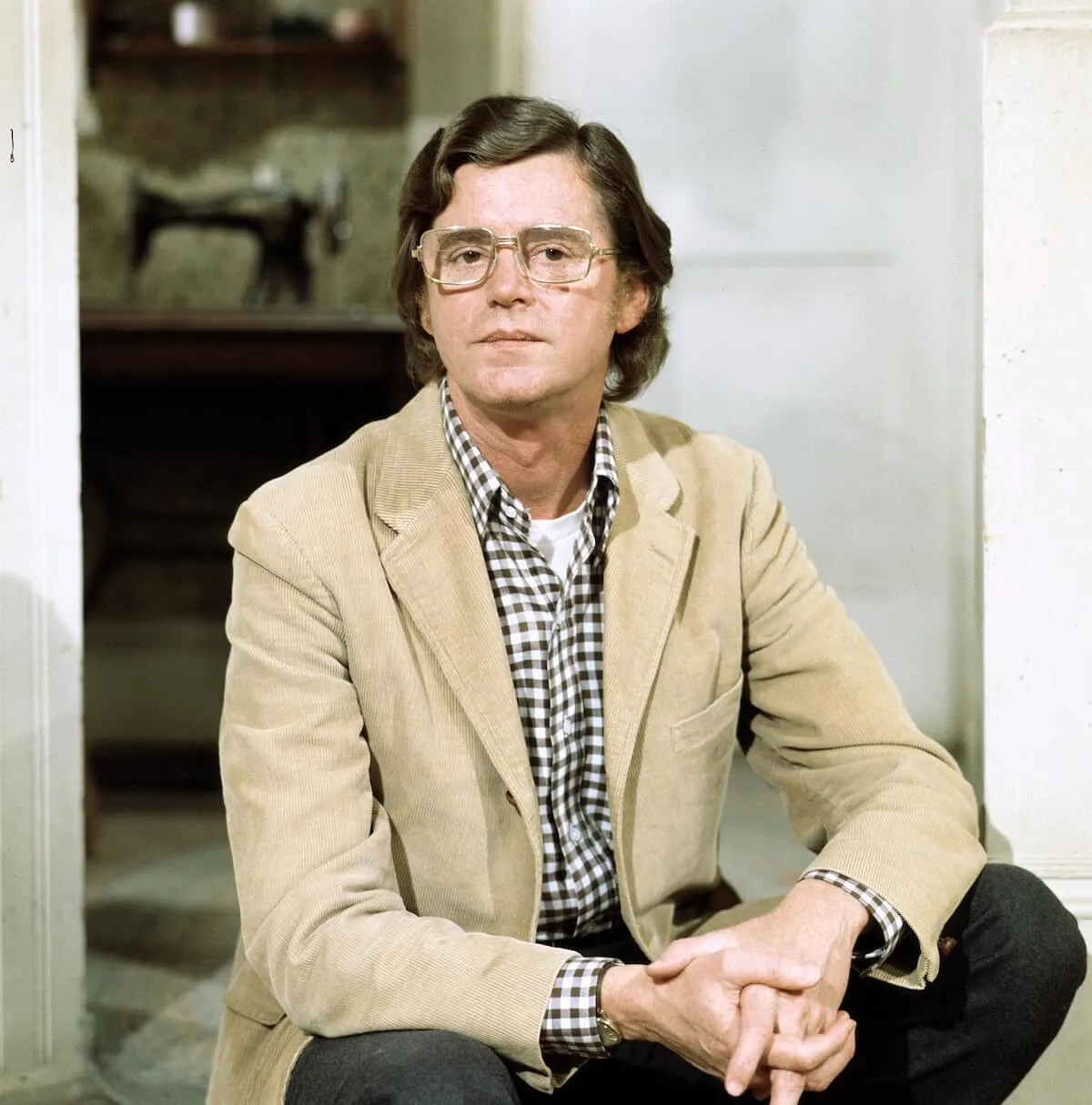 Portrait of 'The Waltons' creator Earl Hamner Jr. wearing a tan jacket