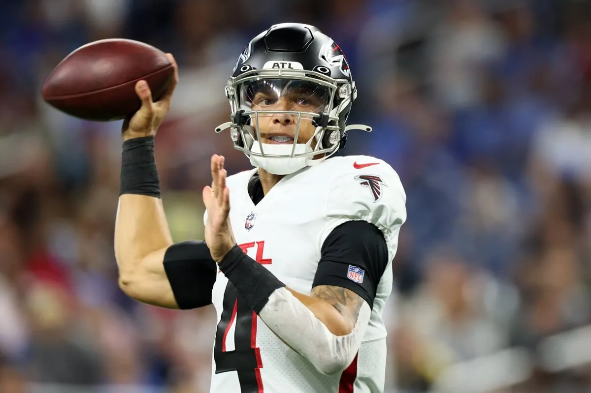 Former Atlanta Falcons quarterback Desmond Ridder throws a pass during an NFL preseason game