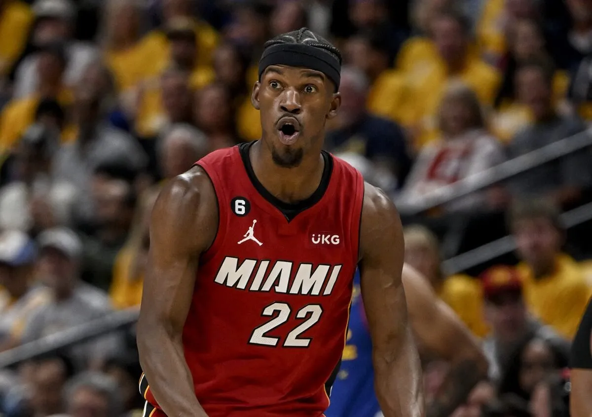 Jimmy Butler of the Miami Heat reacting during a game against the Denver Nuggets