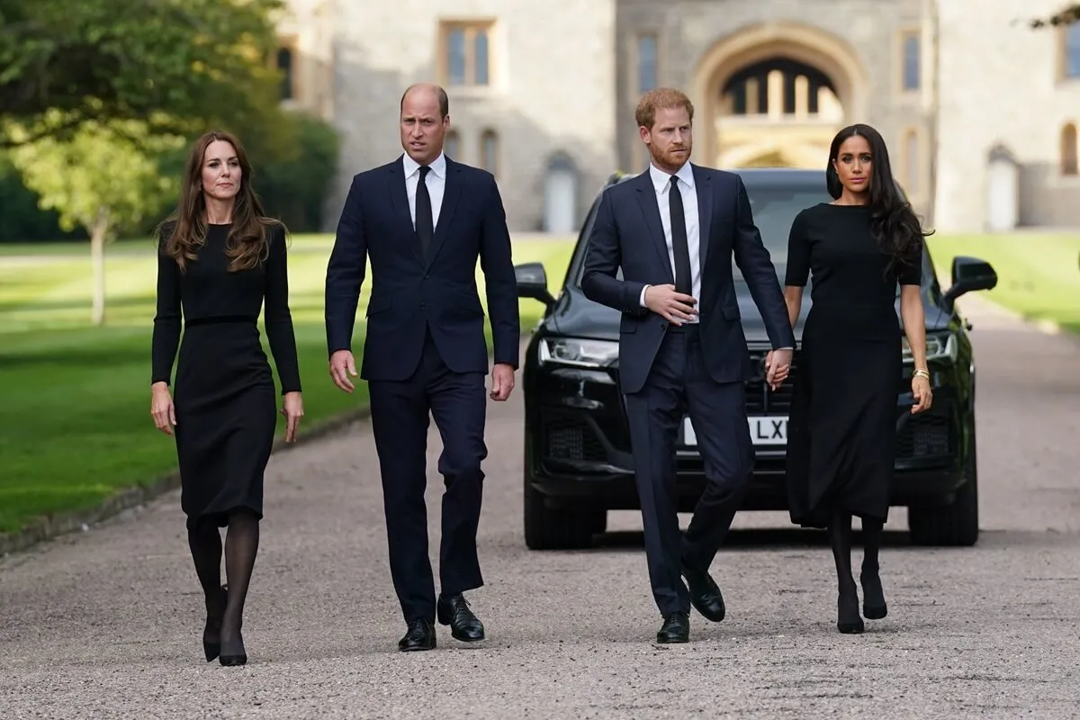 Kate Middleton, Prince William, Prince Harry, and Meghan Markle on the Long Walk at Windsor Castle following Queen Elizabeth II's death