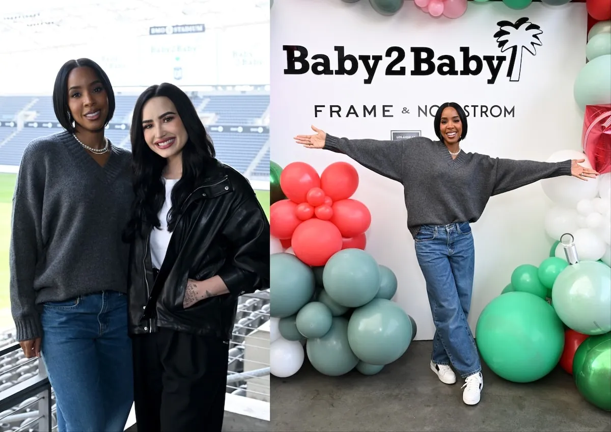 Wearing a gray sweater and baggy jeans, Kelly Rowland smiles with Demi Lovato at the Baby2Baby holiday event