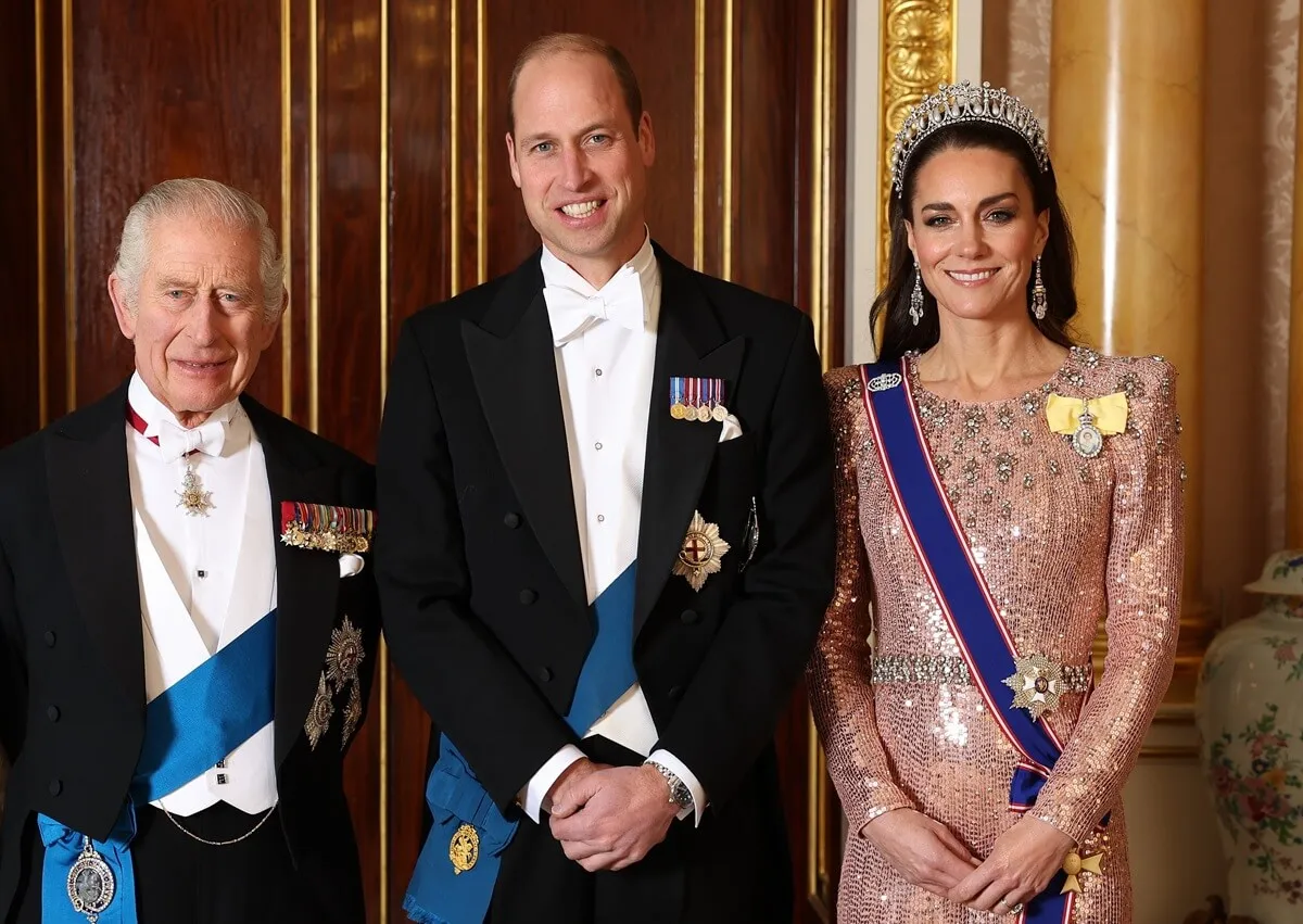 King Charles III, Prince William, Kate Middleton pose for a photograph ahead of The Diplomatic Reception at Buckingham Palace