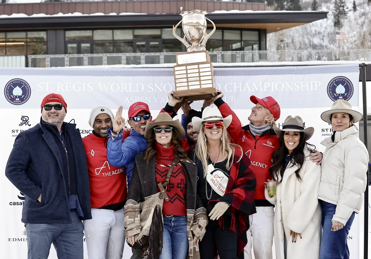  Pierre Henri Ngoumou, Mauricio Umansky, Grant Ganzi and Jason Crowder hoist the St. Regis Cup onstage at the St. Regis World Snow Polo Championships at Rio Grande Park on December 19, 2024 in Aspen, Colorado. 