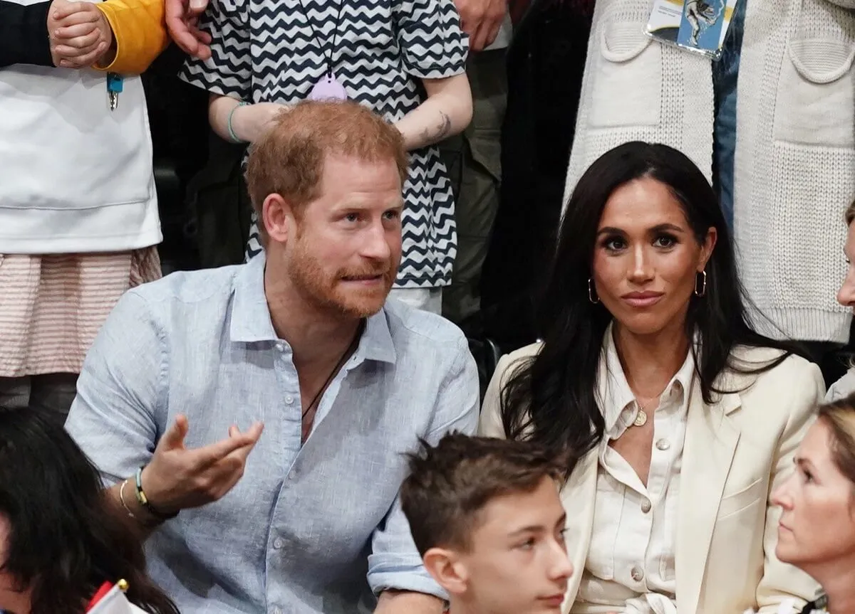 Prince Harry and Meghan Markle watch sitting volleyball at the Merkur Spiel-Arena during the Invictus Games in Dusseldorf, Germany