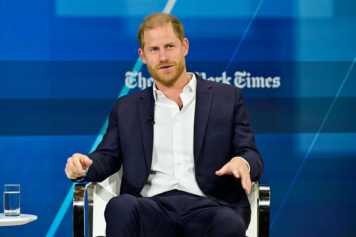 Prince Harry, whose extensive knowledge of polo helped Netflix's 'Polo' series, sits in a chair.