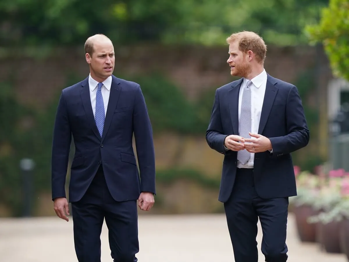 Prince William and Prince Harry arrive for the unveiling of a statue of Princess Diana in the Sunken Garden at Kensington Palace