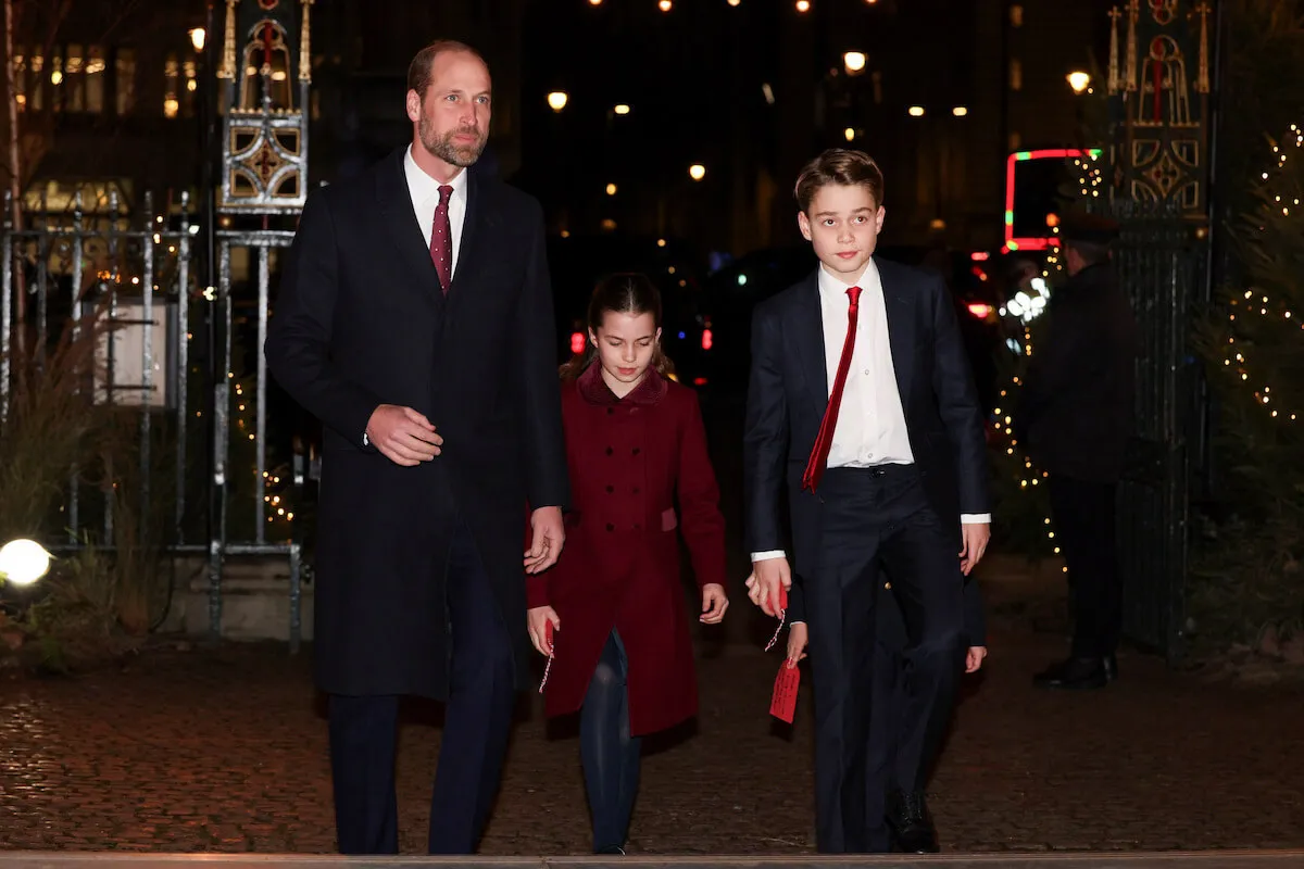 Prince William, who is looking forward to long walks over Christmas, with Princess Charlotte and Prince George at the Together at Christmas carol concert