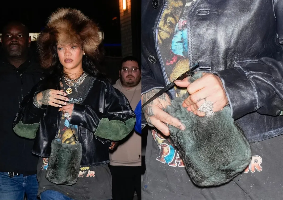 Wearing a huge fur hat and gigantic diamond ring, Rihanna looks at the paparazzi in NYC