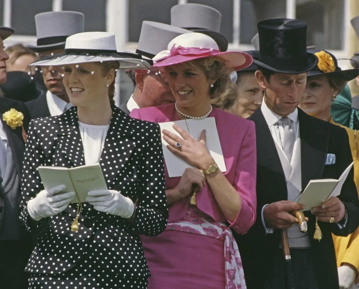 Sarah Ferguson, Princess Diana, and then-Prince Charles during Derby Day at Epsom, U.K. (circa 1987)