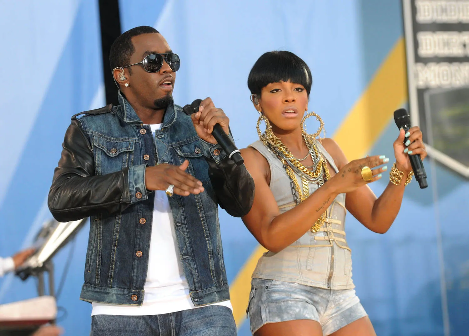 Diddy performs next to Dawn Richard on stage on ABC's 'Good Morning America' in 2010