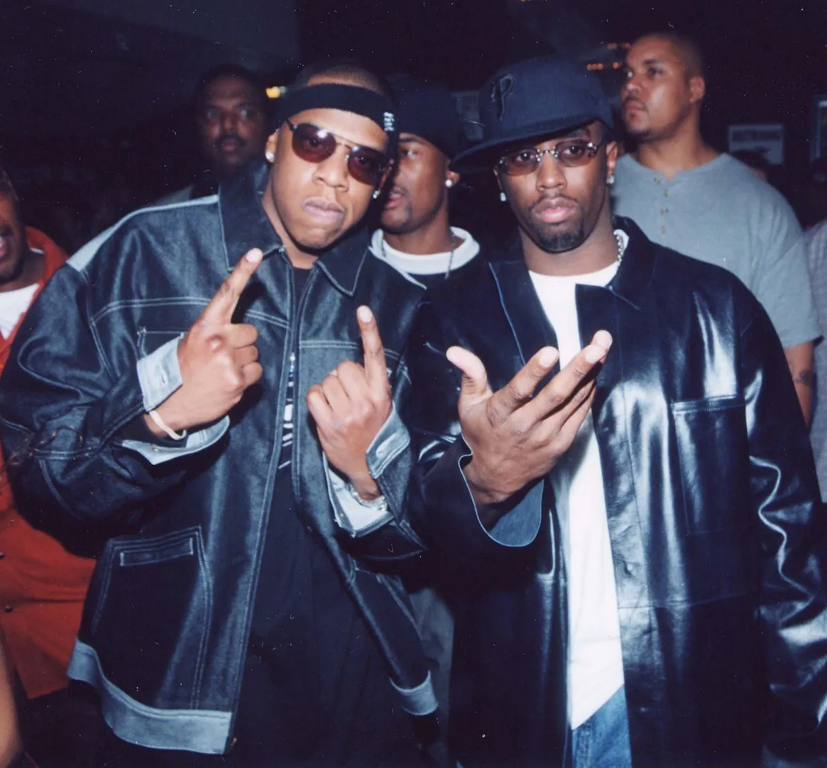 Sean Diddy Combs and Jay-Z in black jackets