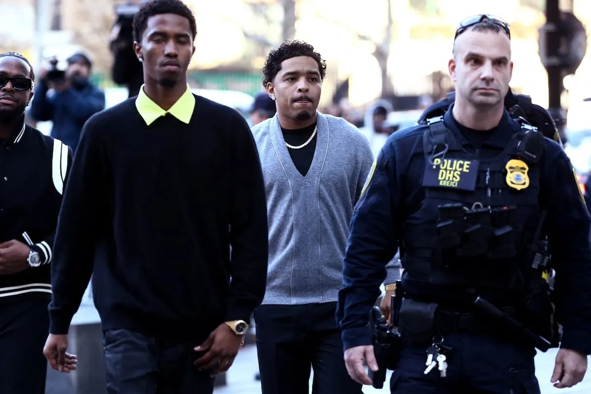 Sean 'Diddy' Combs' sons, King Combs (L) and Justin Dior Combs, arrive at his December 18 court hearing