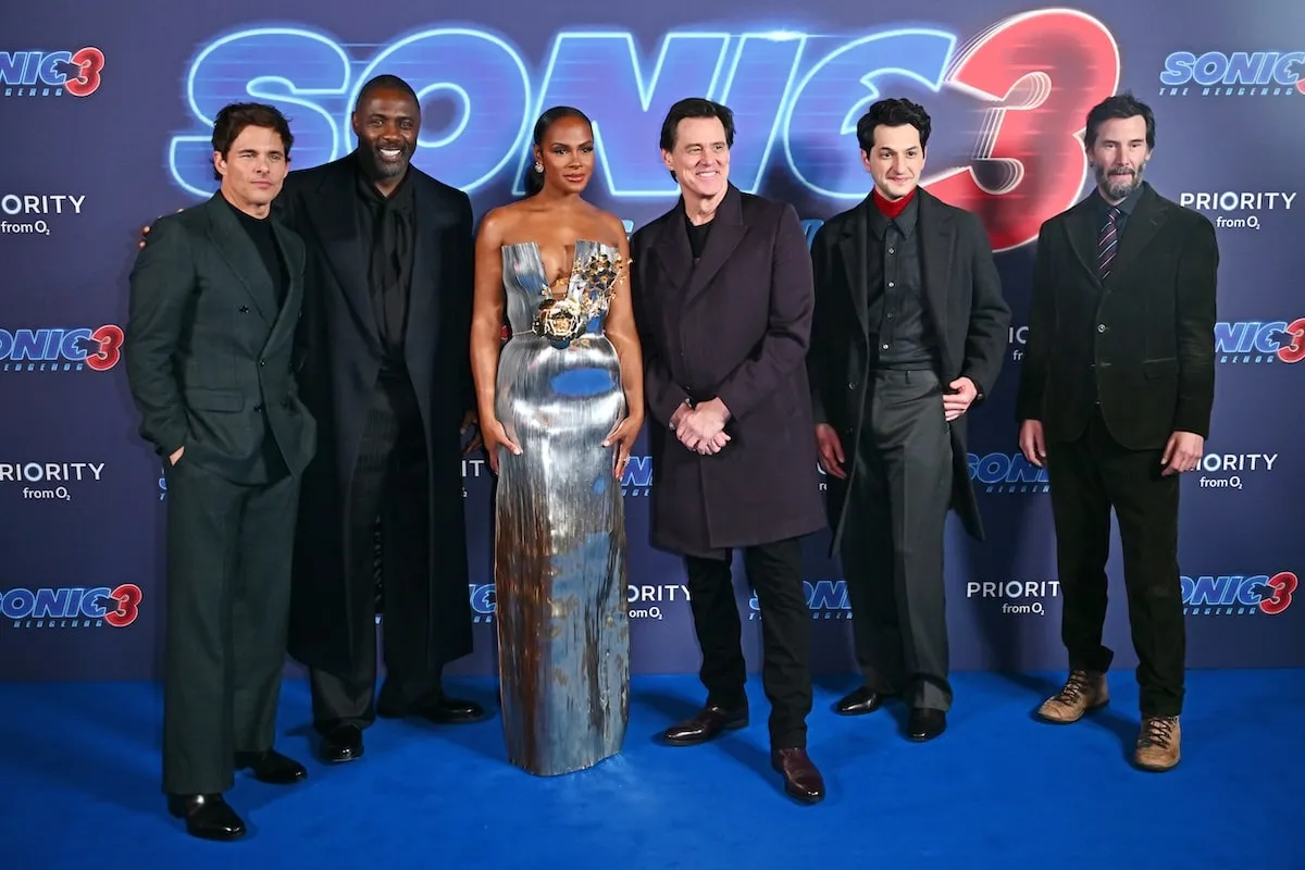 The cast of Sonic The Hedgehog 3, Ben Schwartz, Keanu Reeves, Jim Carrey, Tika Sumpter, and Indris Elba smile at the London premiere on the red carpet