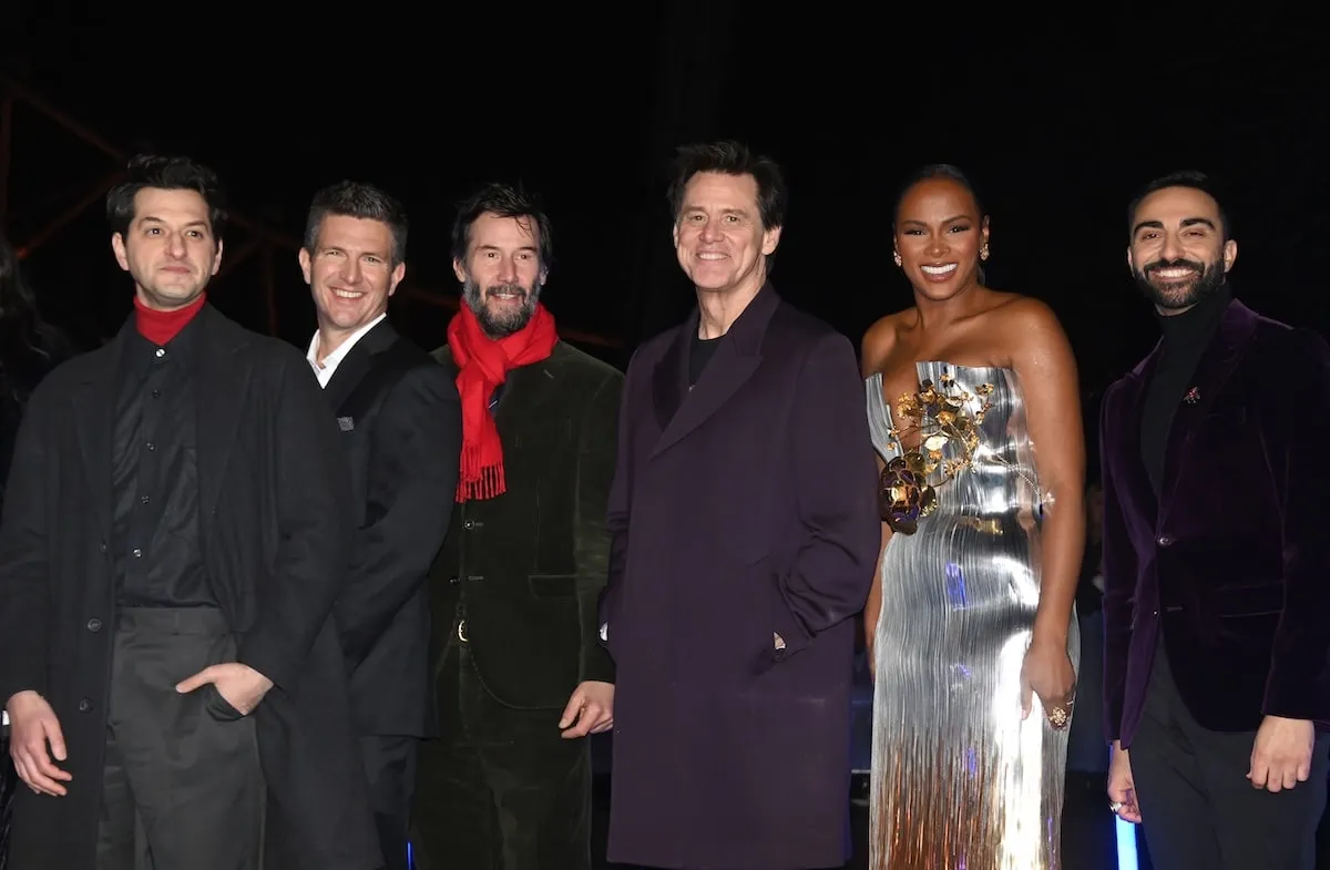 The cast of Sonic The Hedgehog 3, Ben Schwartz, Jeff Fowler, Keanu Reeves, Jim Carrey, Tika Sumpter, and Lee Majdoub, smiles at the London premiere on the red carpet