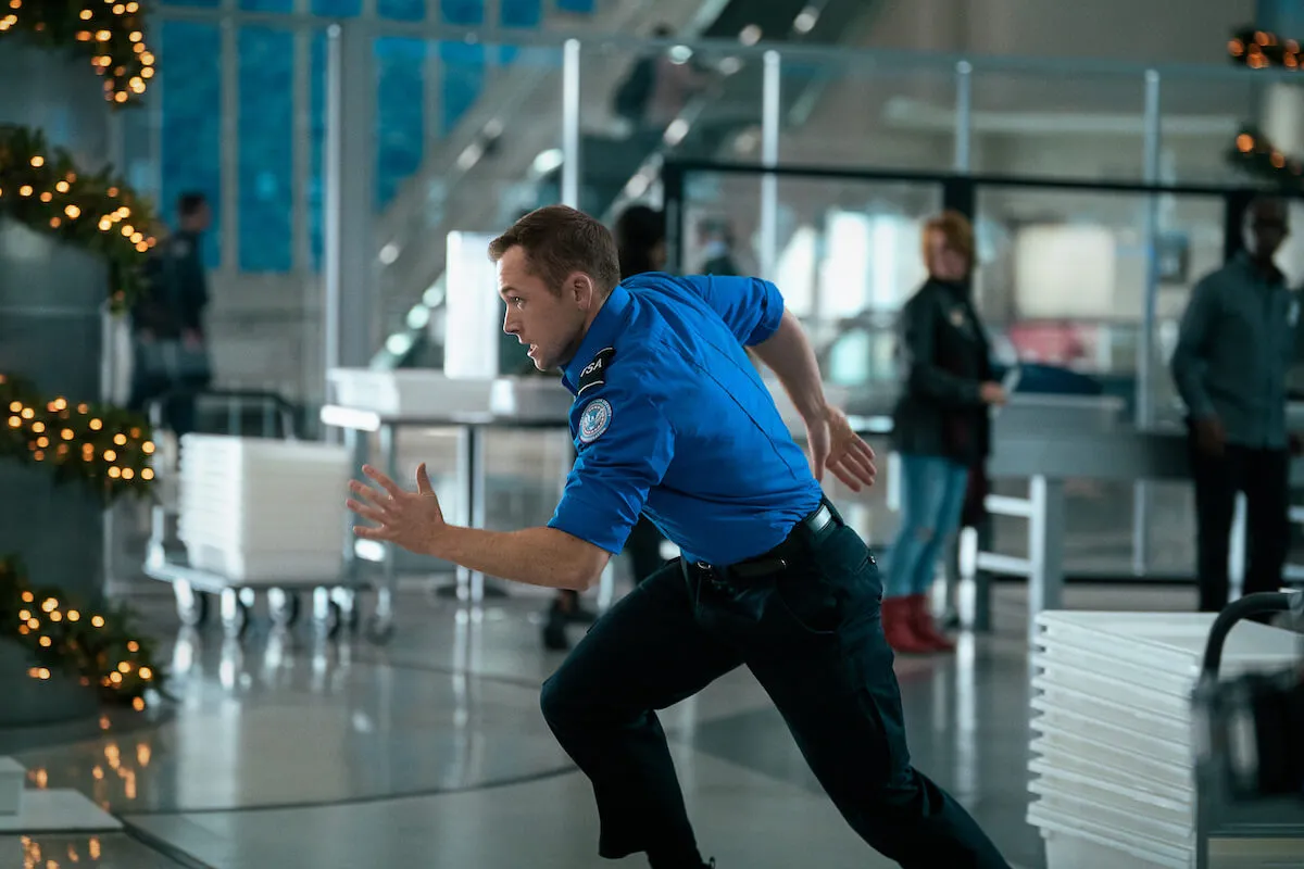 Taron Egerton runs in 'Carry-On'