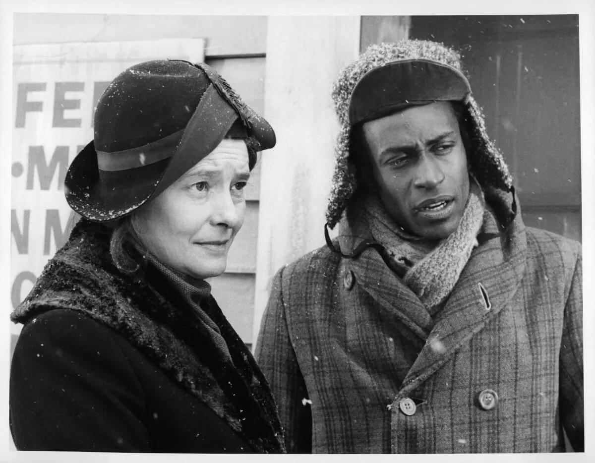 Black and white photo of Patricia Neal and Cleavon Little in winter jackets and hats in 'The Homecoming: A Christmas Story'