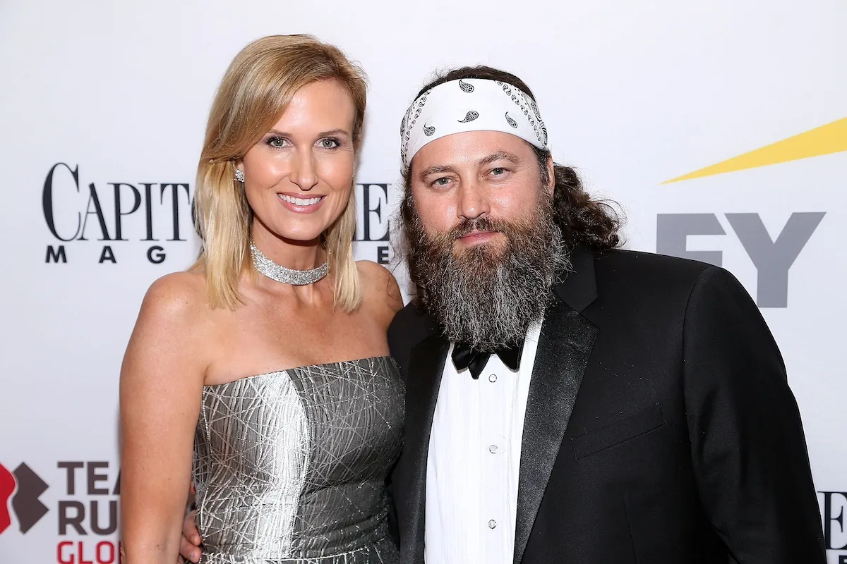 Duck Dynasty stars Kore and Willie Robertson post for a photo at an event at Donald Trump's 2016 inauguration