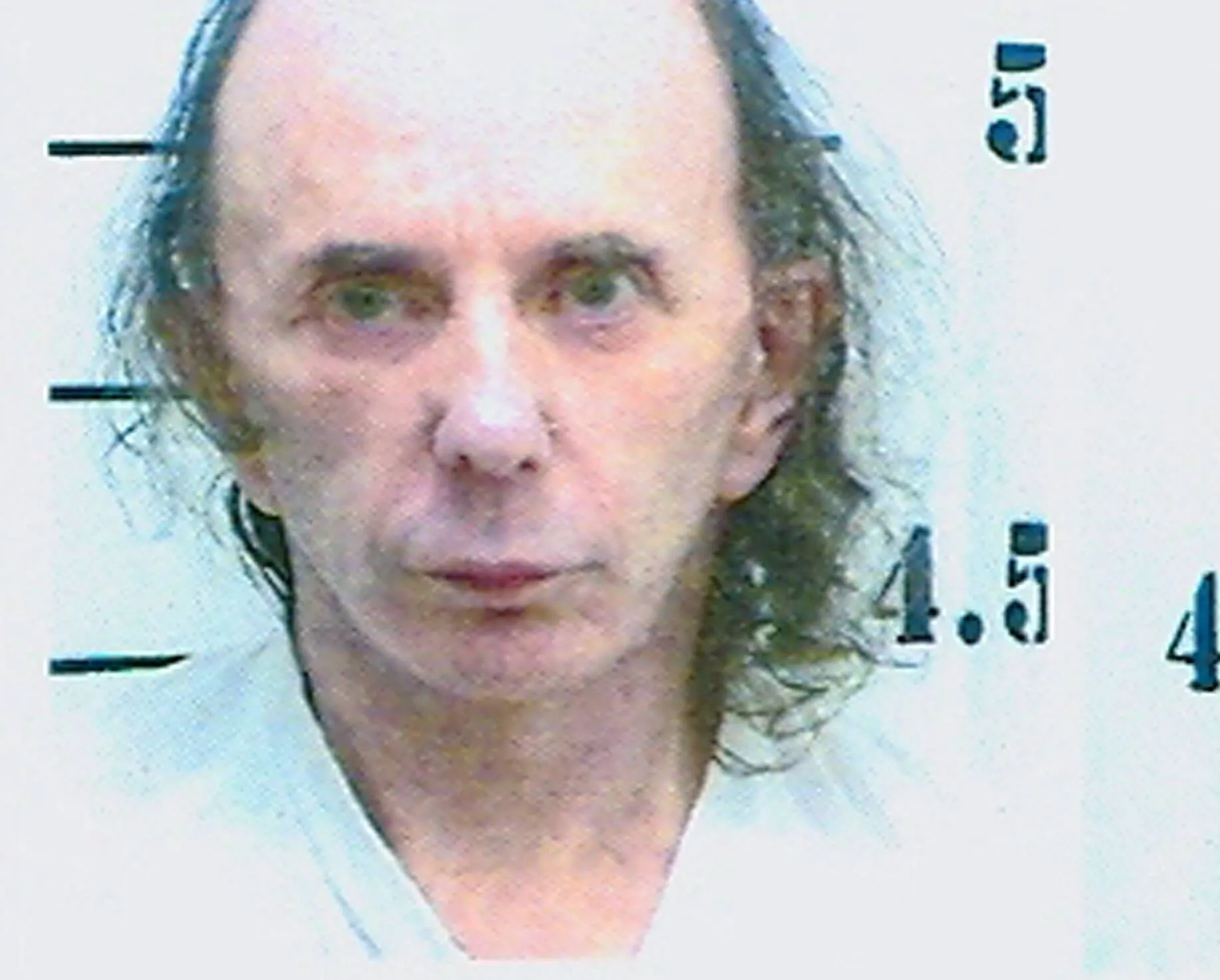 A mug shot of Phil Spector, the mind behind the best Christmas song