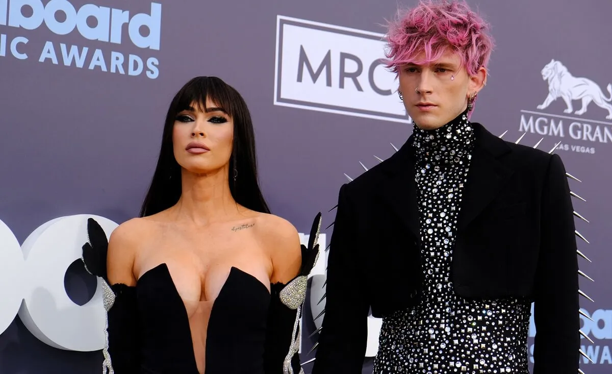 Machine Gun Kelly and Megan Fox posing at the MGM Grand Garden Arena in Las Vegas, Nevada.