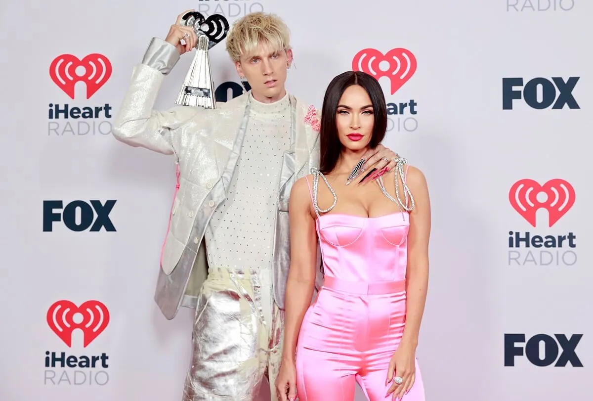 Machine Gun Kelly and Megan Fox posing at The Dolby Theatre in Los Angeles, California.