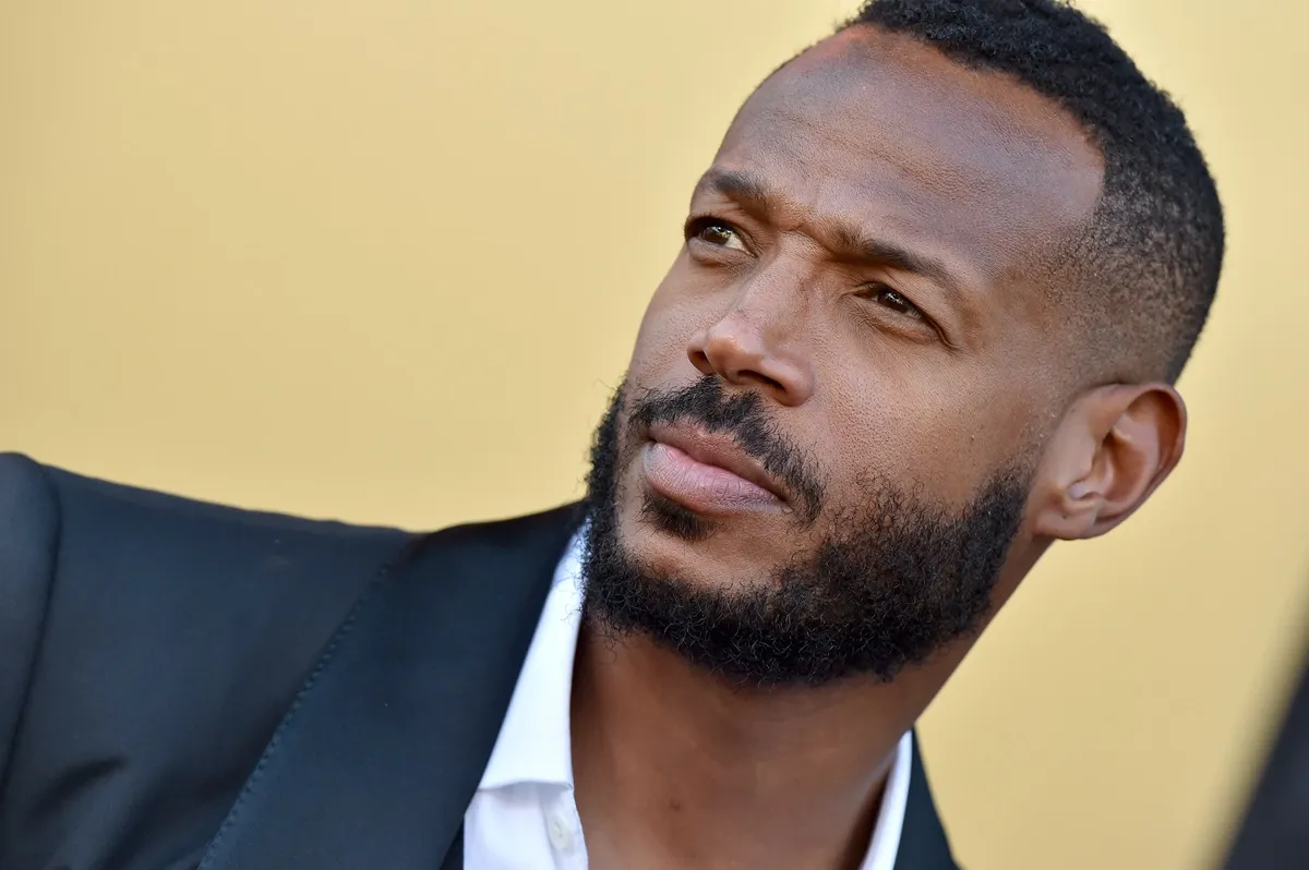 Marlon Wayans attends the Los Angeles Premiere of MGM's "Respect" in a suit.