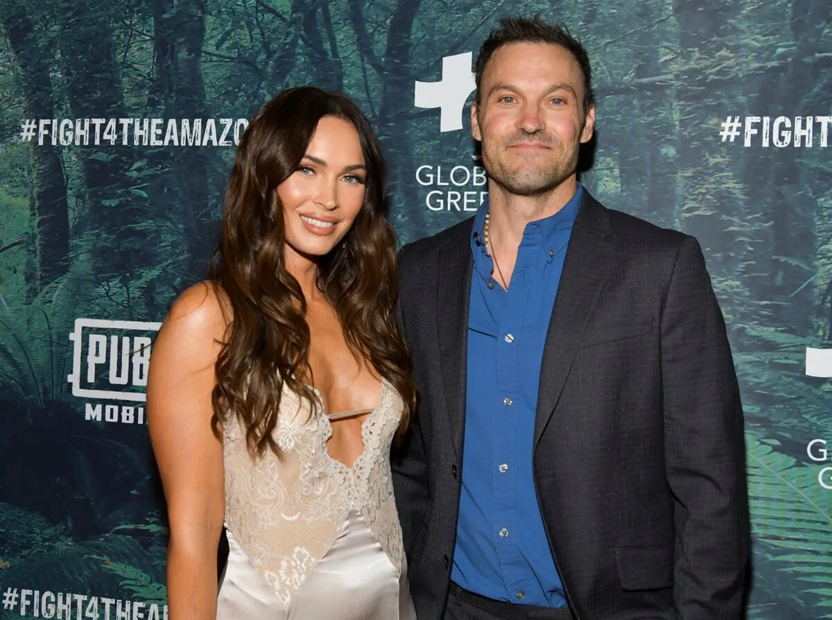 Megan Fox posing alongside Brian Austin Green at the PUBG Mobile's #FIGHT4THEAMAZON Event at Avalon Hollywood.