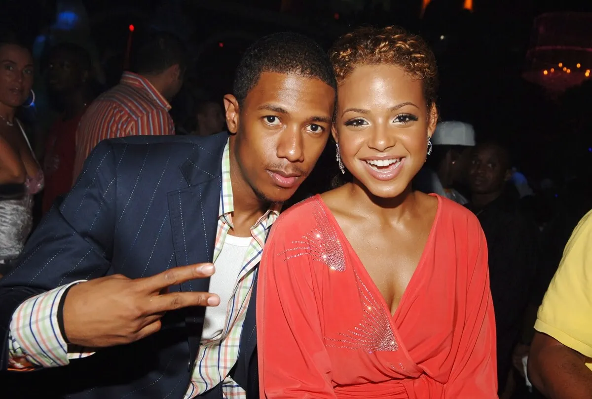 Nick Cannon and Christina Milian posing together at the Island Def Jam Music Group Party.